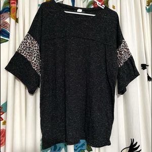 speckled with leopard stripes